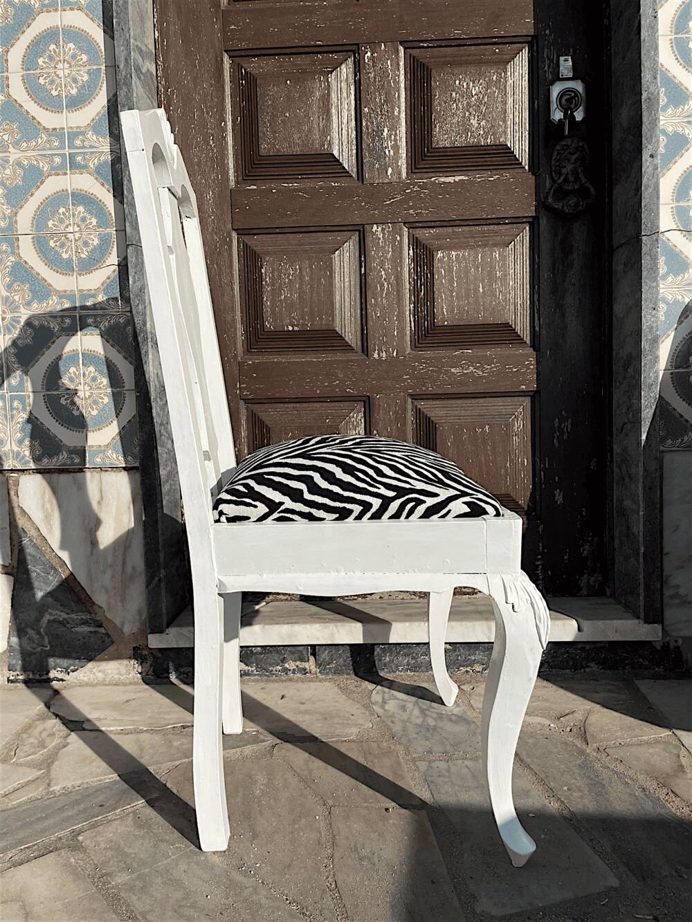 Antique Baroque chair redesigned in Zebra fabric