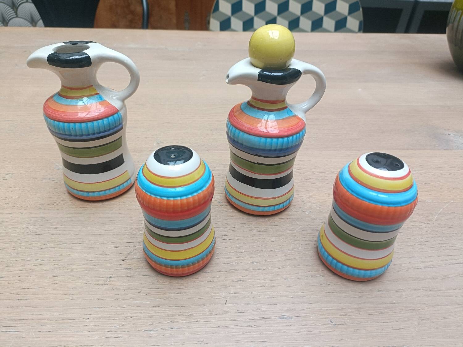 Vinegar and oil set, salt shaker and pepper shaker.