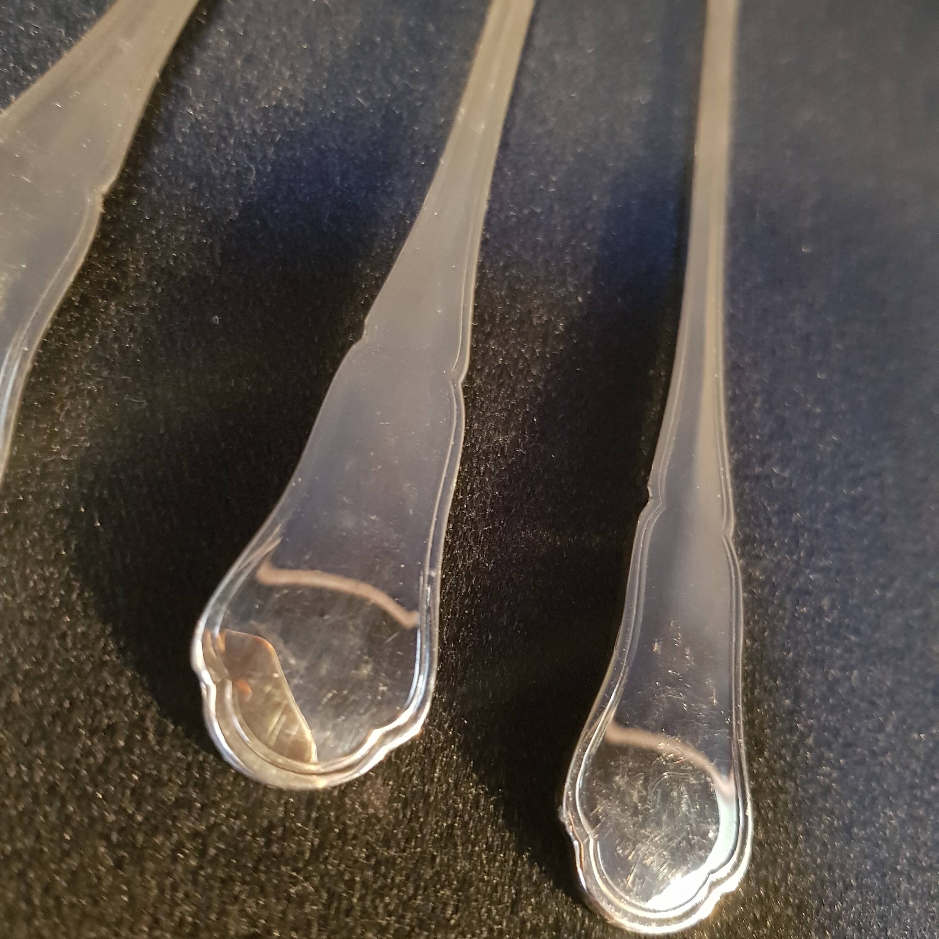 Long silver-plated ice cream spoons