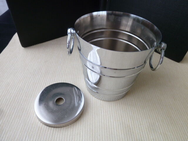 Ice bucket and vintage stainless steel drainer