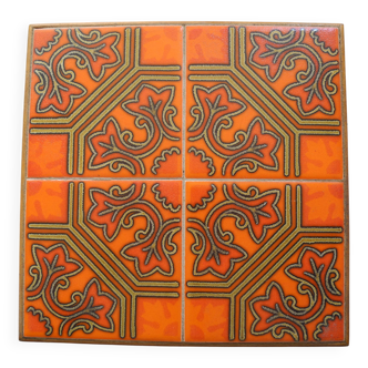 Dessous de plat ancien en faïence orange vintage