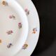 Round Limoges porcelain platter by Georges Boyer, 28.5cm diameter