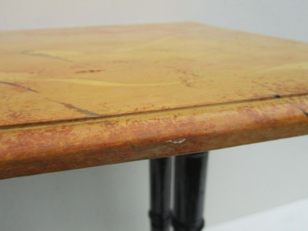 Wooden side table painted in faux marble