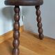 Tripod stool in wood turned coil way