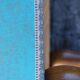 Repose-pieds bois et tissu bleu
