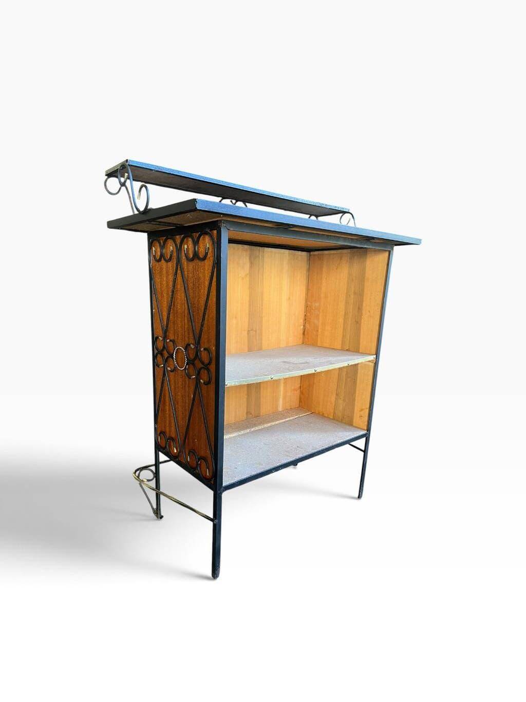Vintage wooden bar counter with ceramic accents.