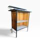 Vintage wooden bar counter with ceramic accents.