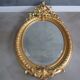 Antique mirror in wood and gilded stucco