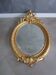 Antique mirror in wood and gilded stucco
