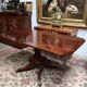 Victorian extendable dining table. Rosewood, bronze decoration. England. Early 19th century.