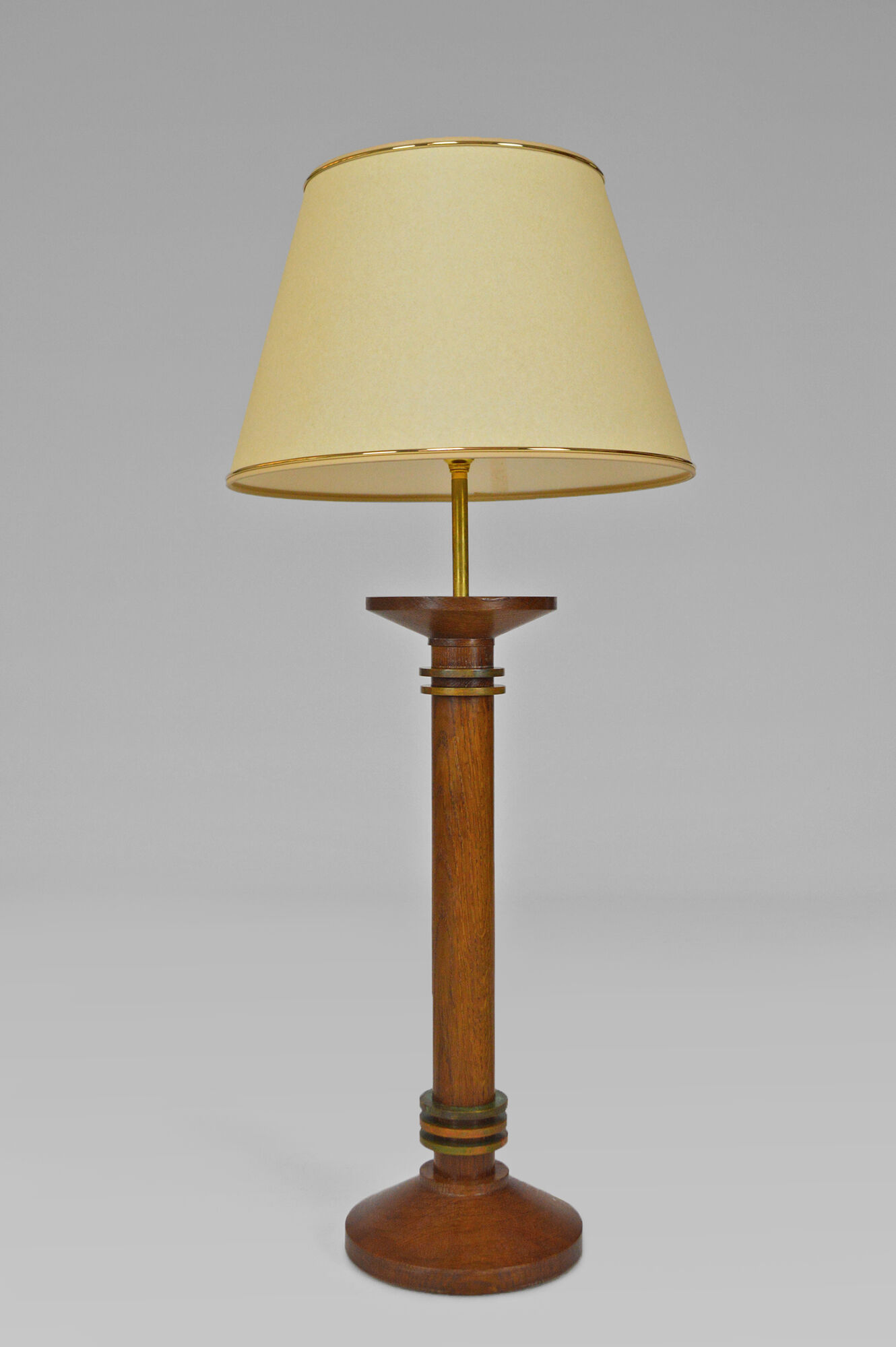 Pair of art deco lamps in wood and patinated bronze around 1930