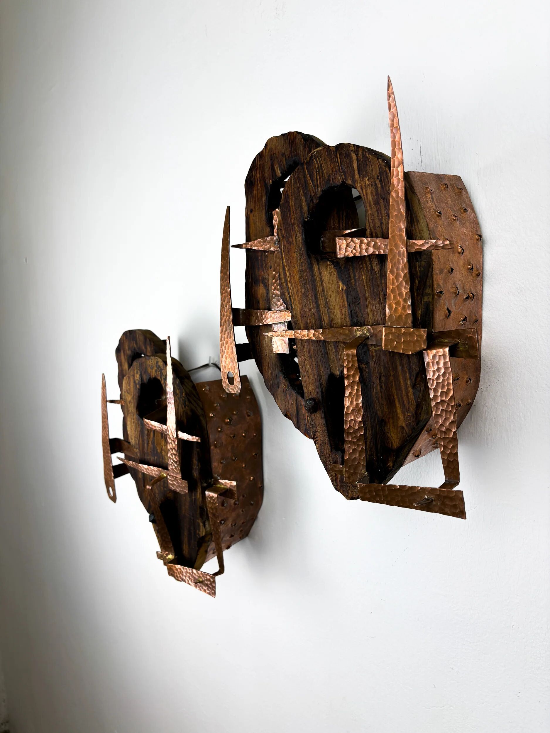 Pair of Brutalist wood & copper wall sconces, Italy, 1970s