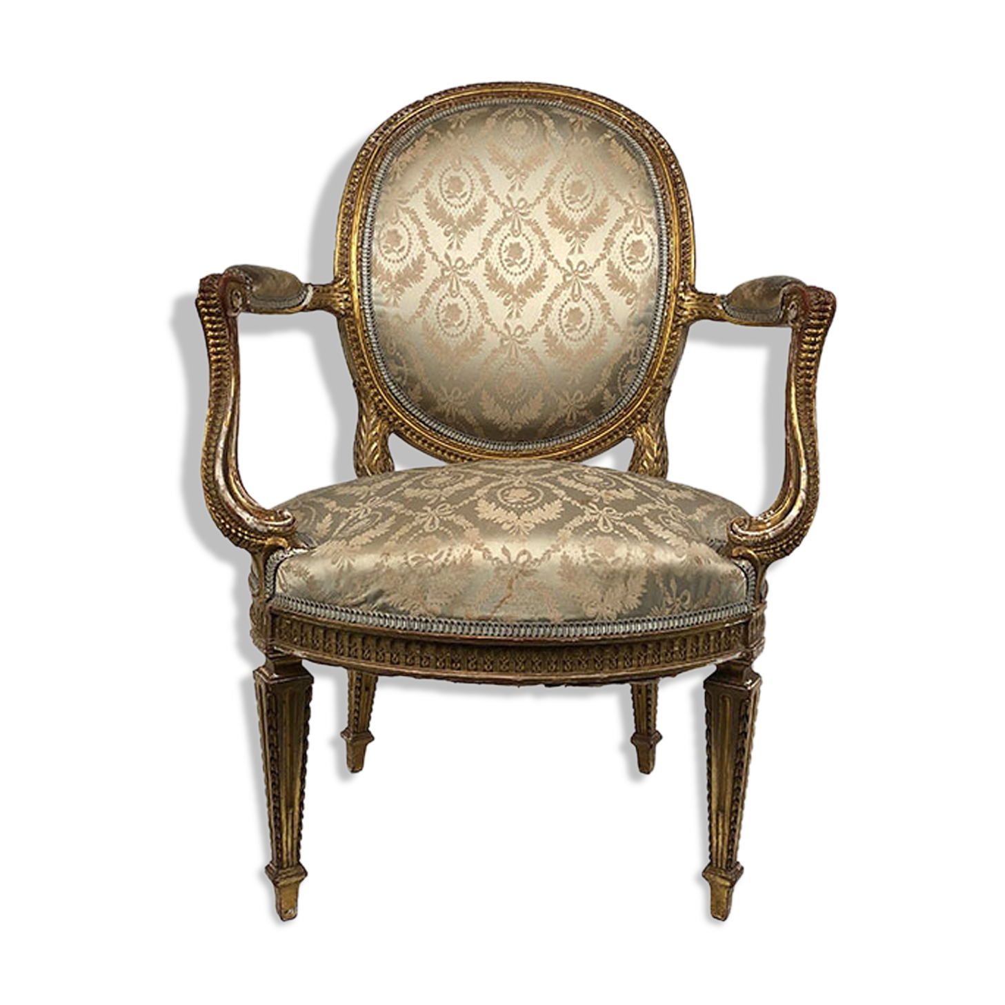 Carved and gilded wooden armchair in Louis XVI style, circa 1900