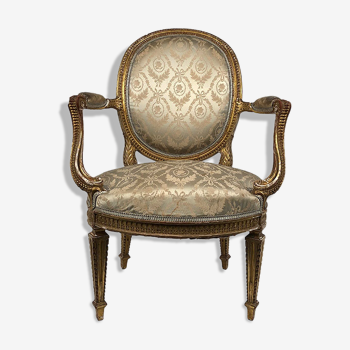 Carved and gilded wooden armchair in Louis XVI style, circa 1900