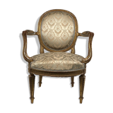 Carved and gilded wooden armchair in Louis XVI style, circa 1900