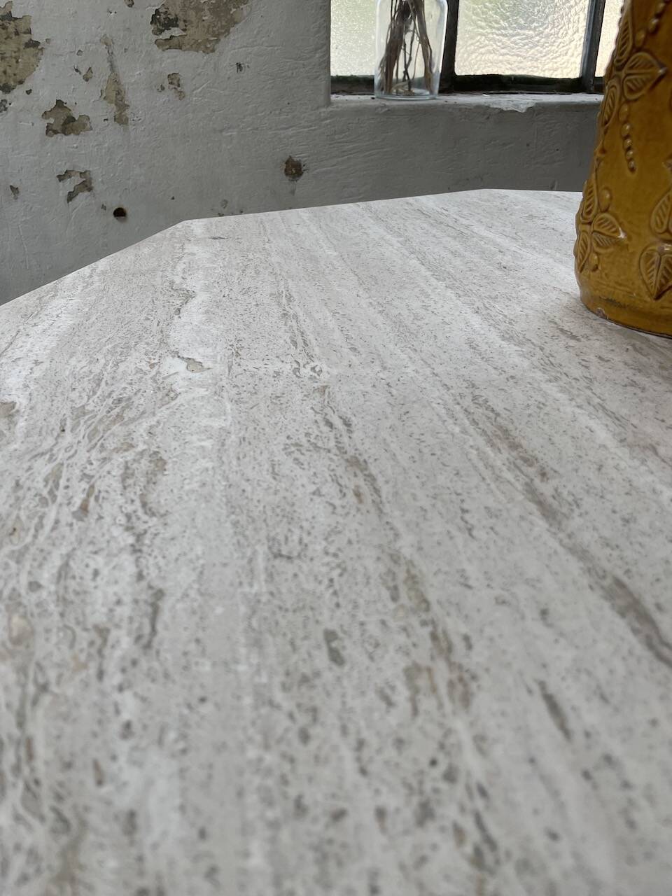 Octagonal travertine coffee table