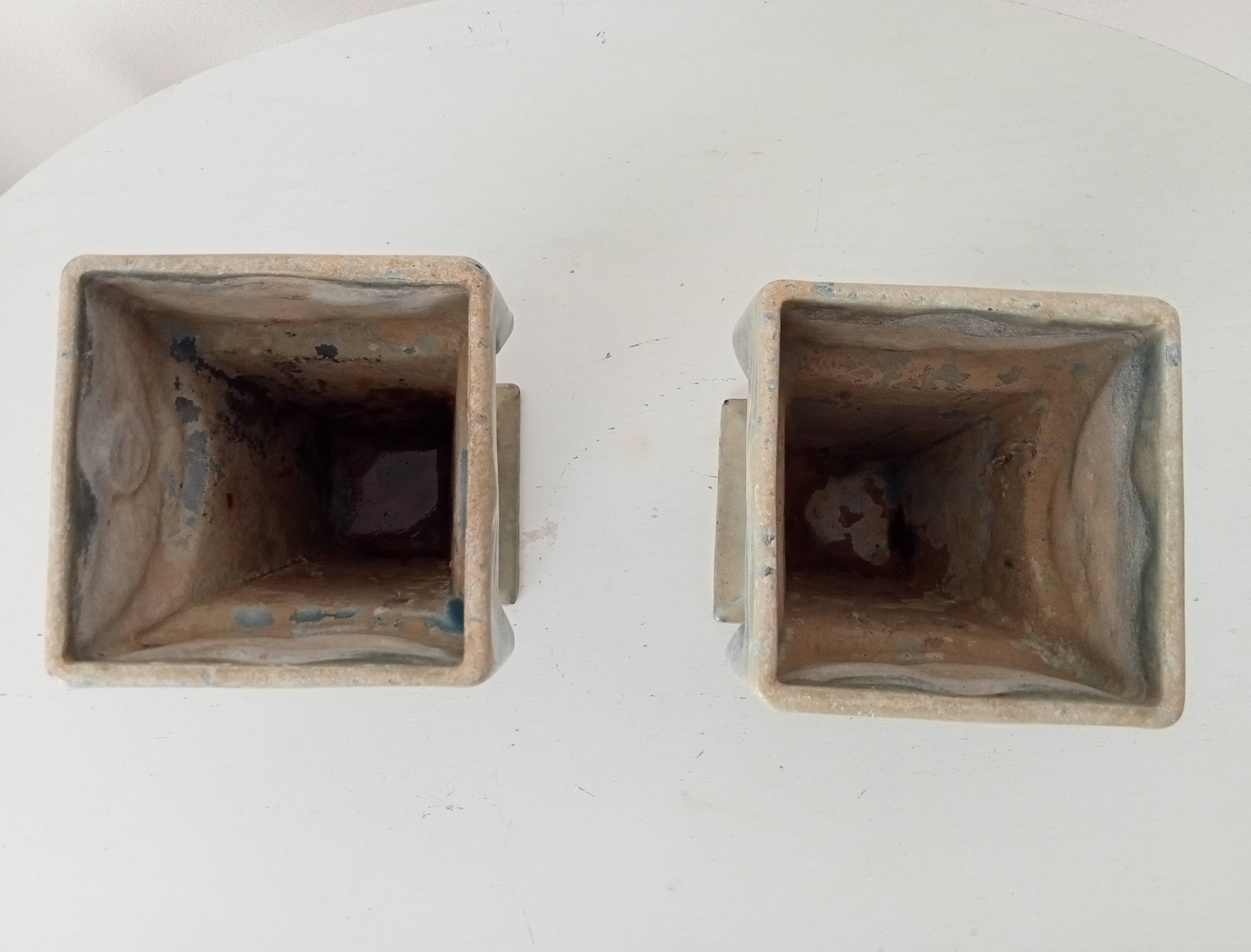 Pair of old art deco vases in enameled cast iron