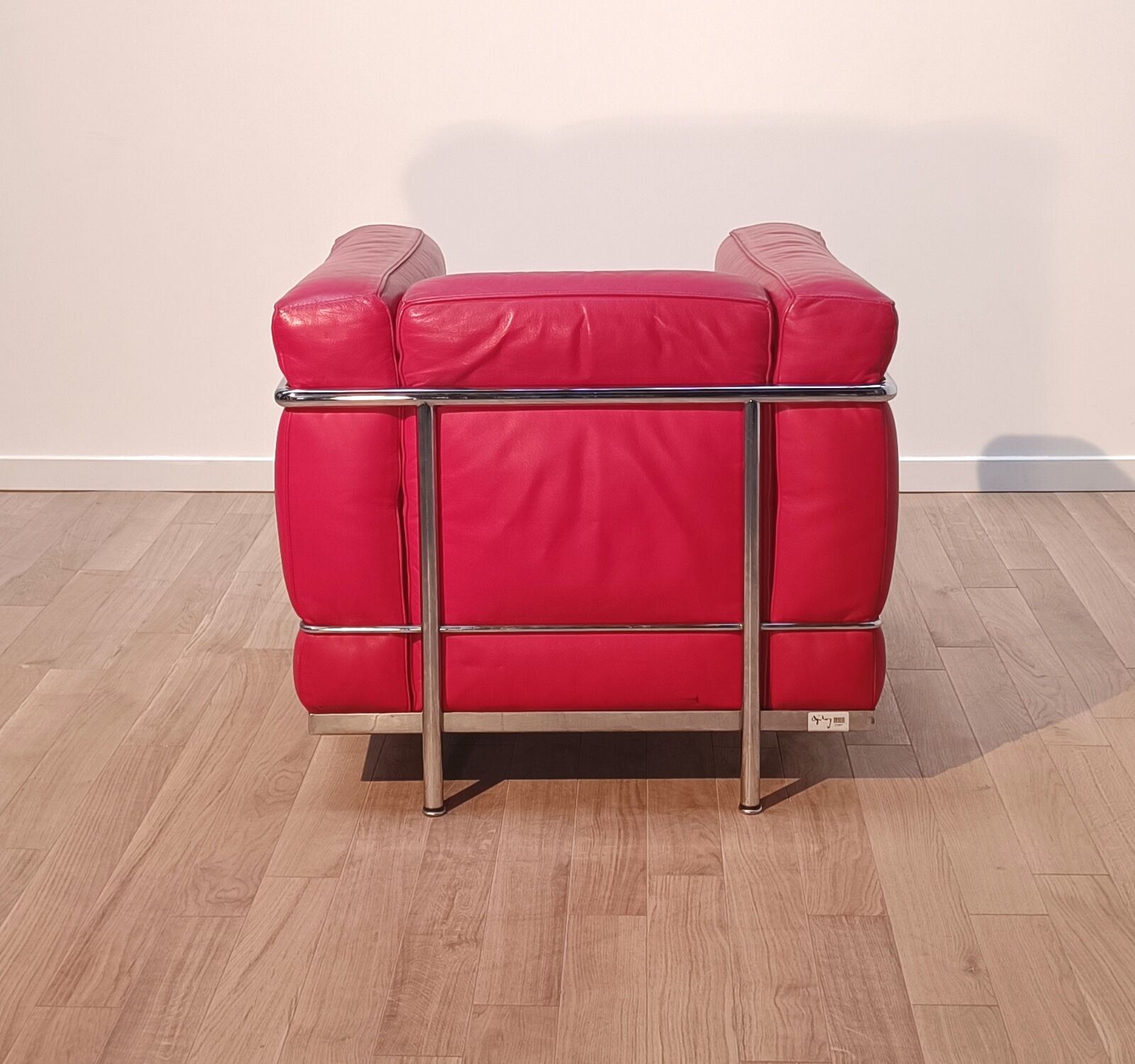 Pair of LC2 armchairs, Le Corbusier for Cassina