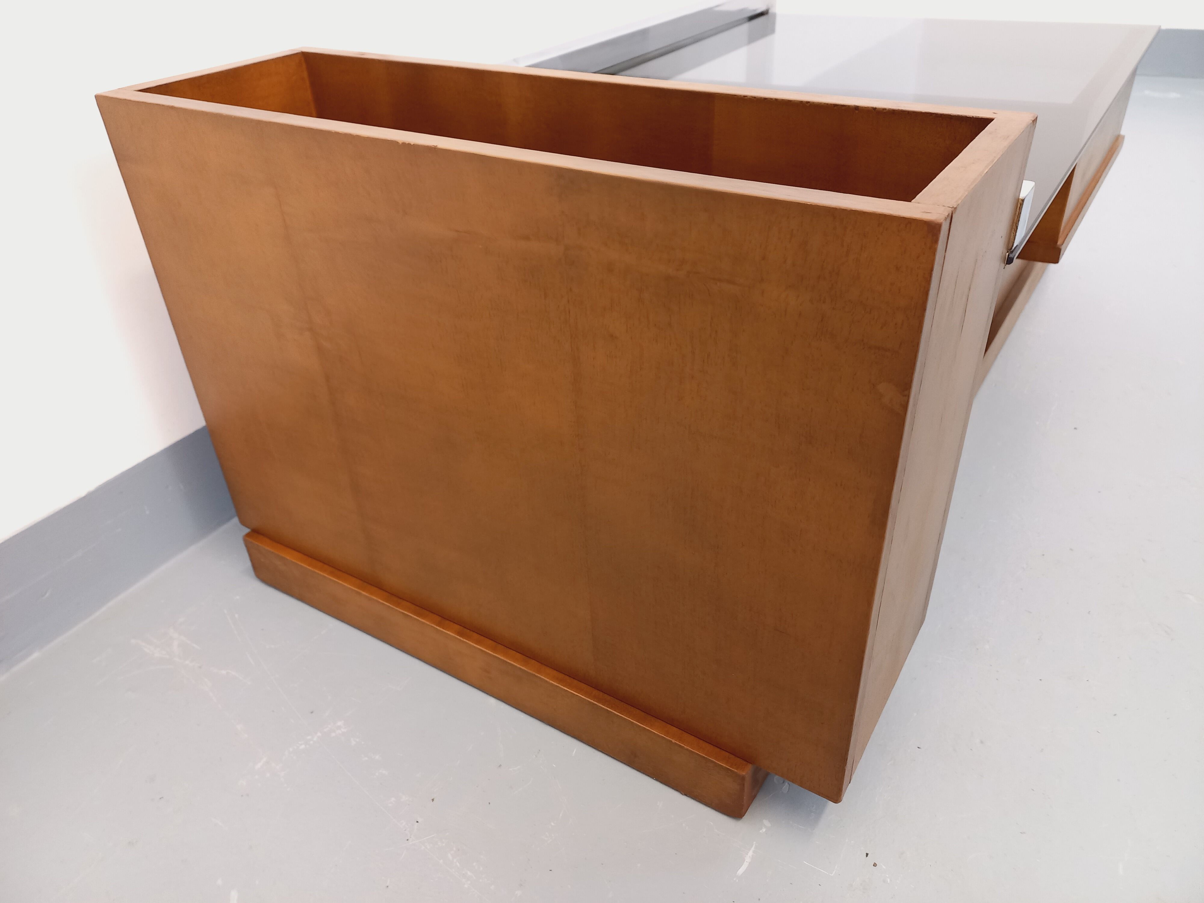 Rectangular vintage modernist coffee table with wooden niches, chrome.