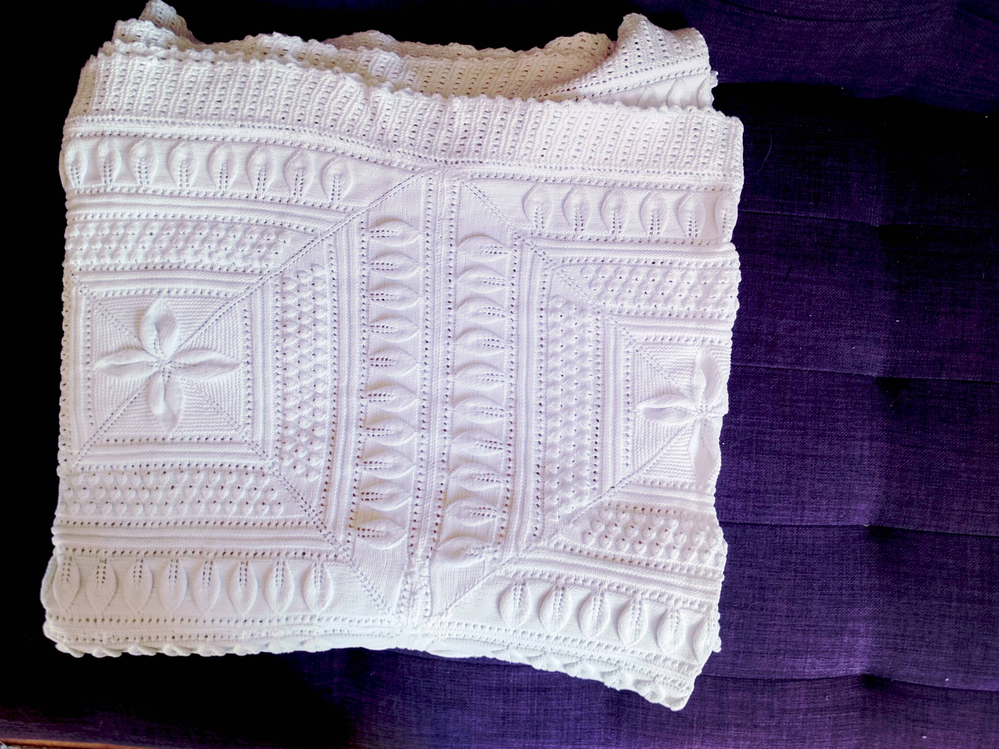 Knitted white cotton bedspread