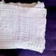 Knitted white cotton bedspread