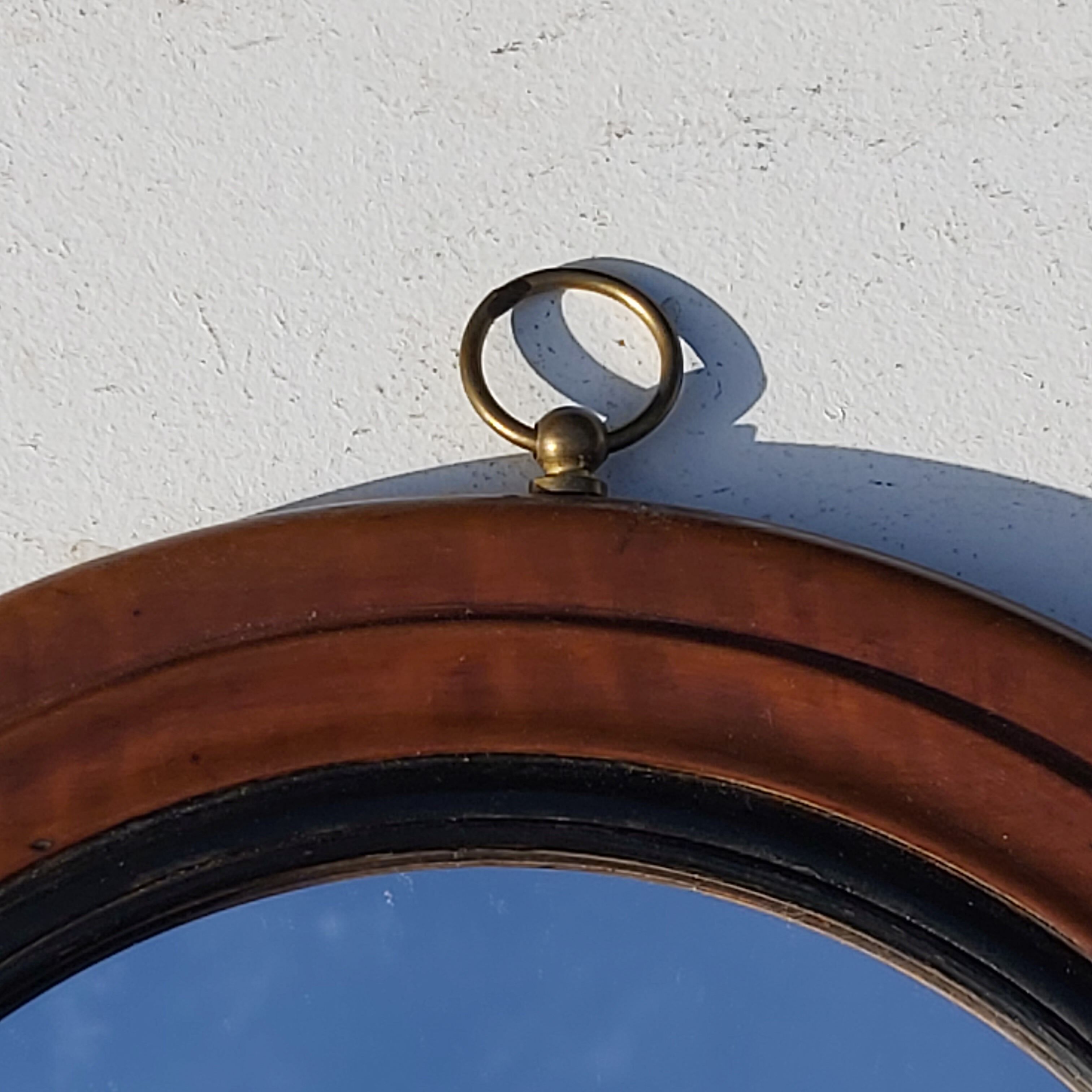 Old wooden round mirror