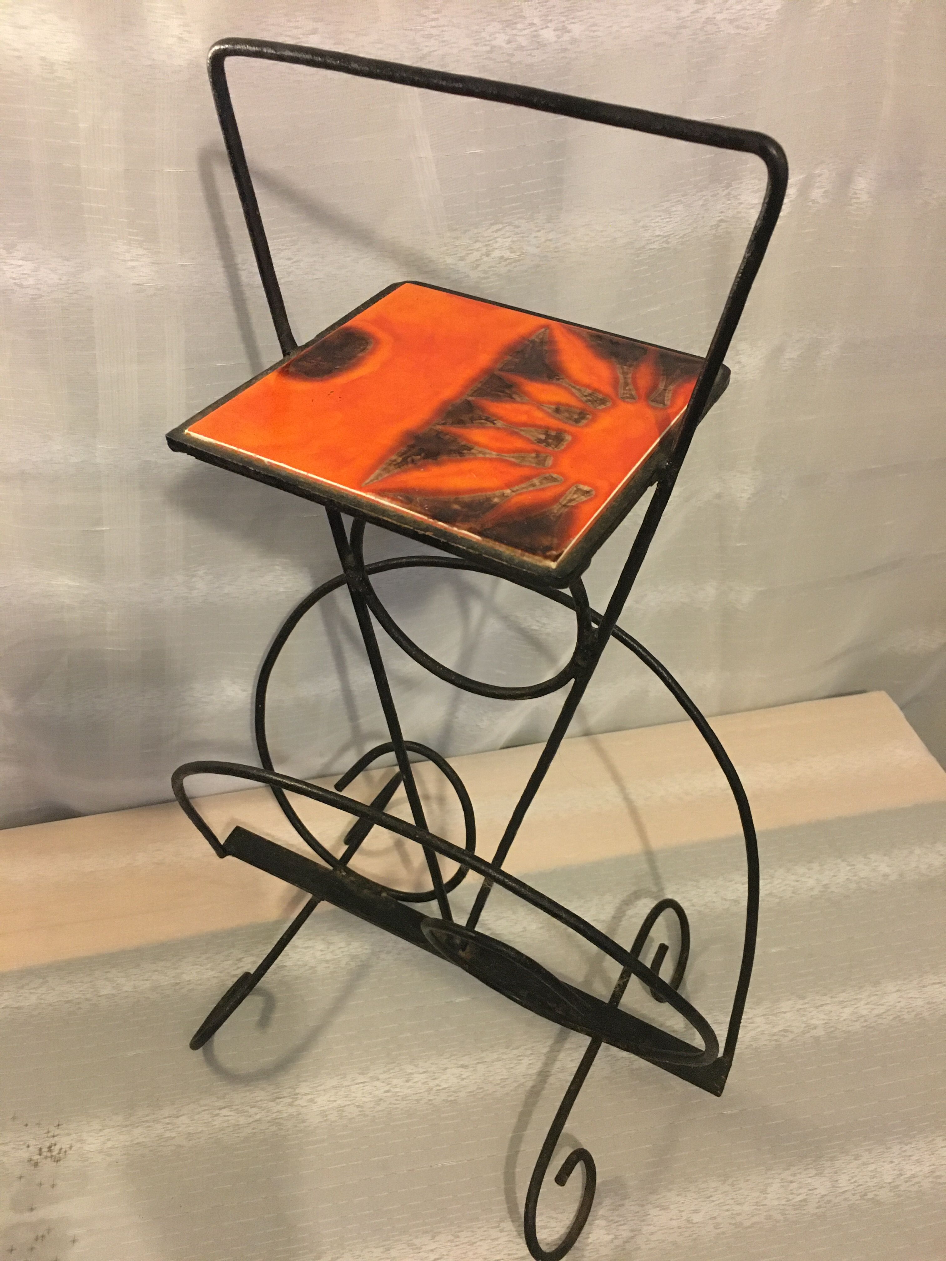 Wrought iron newspaper holder