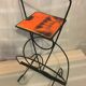 Wrought iron newspaper holder