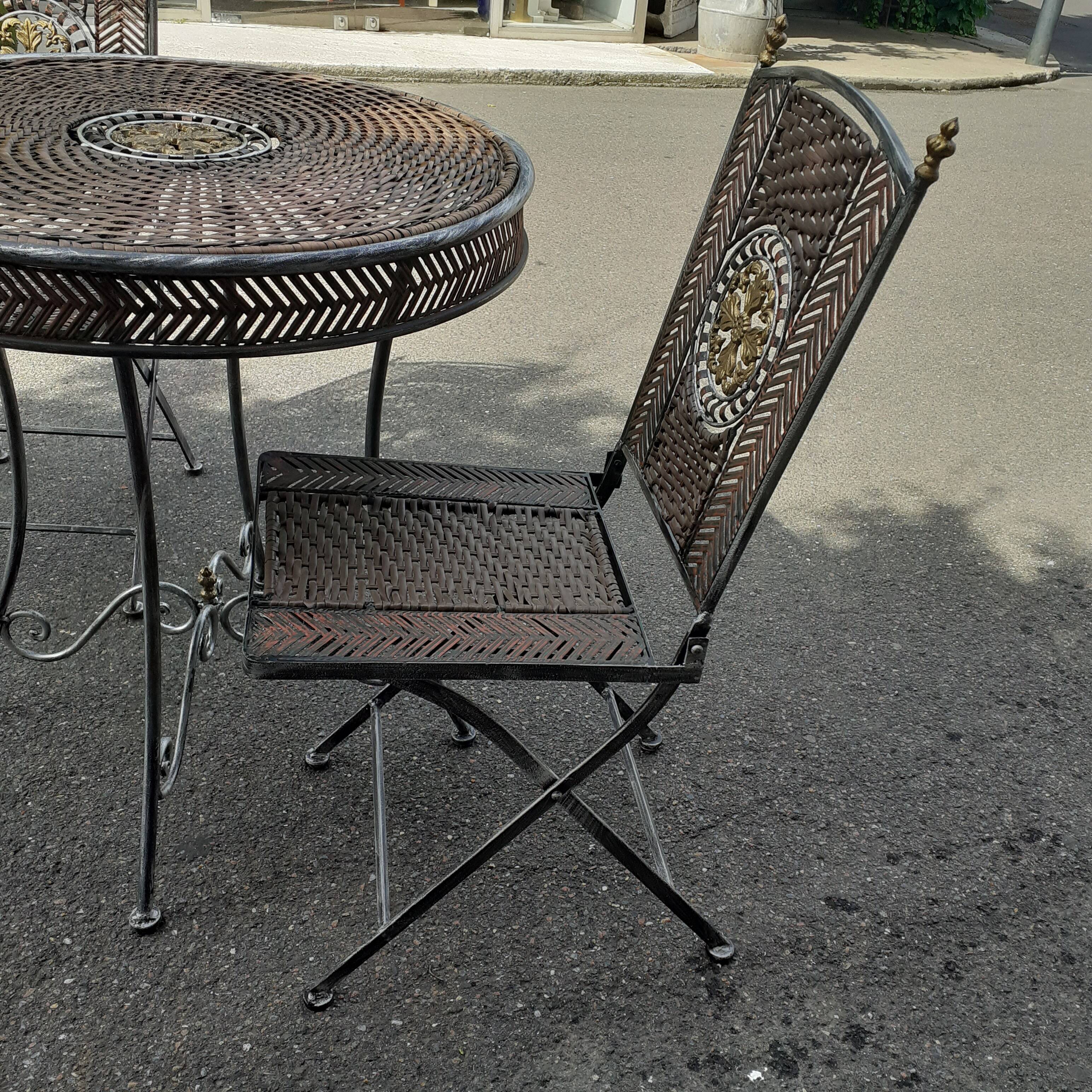 Garden furniture in rattan and wrought iron