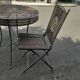 Garden furniture in rattan and wrought iron