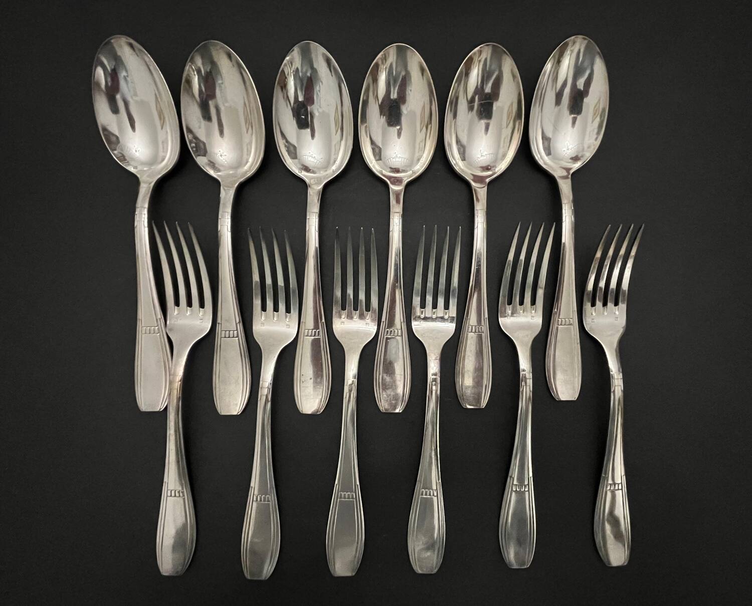 12 silver-plated Art Deco cutlery sets