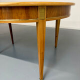 Round walnut Napoleon III extendable table with bronze top in good condition.