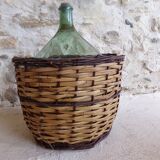Dame-jeanne in her basket
