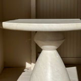 Travertine-effect stone dining table