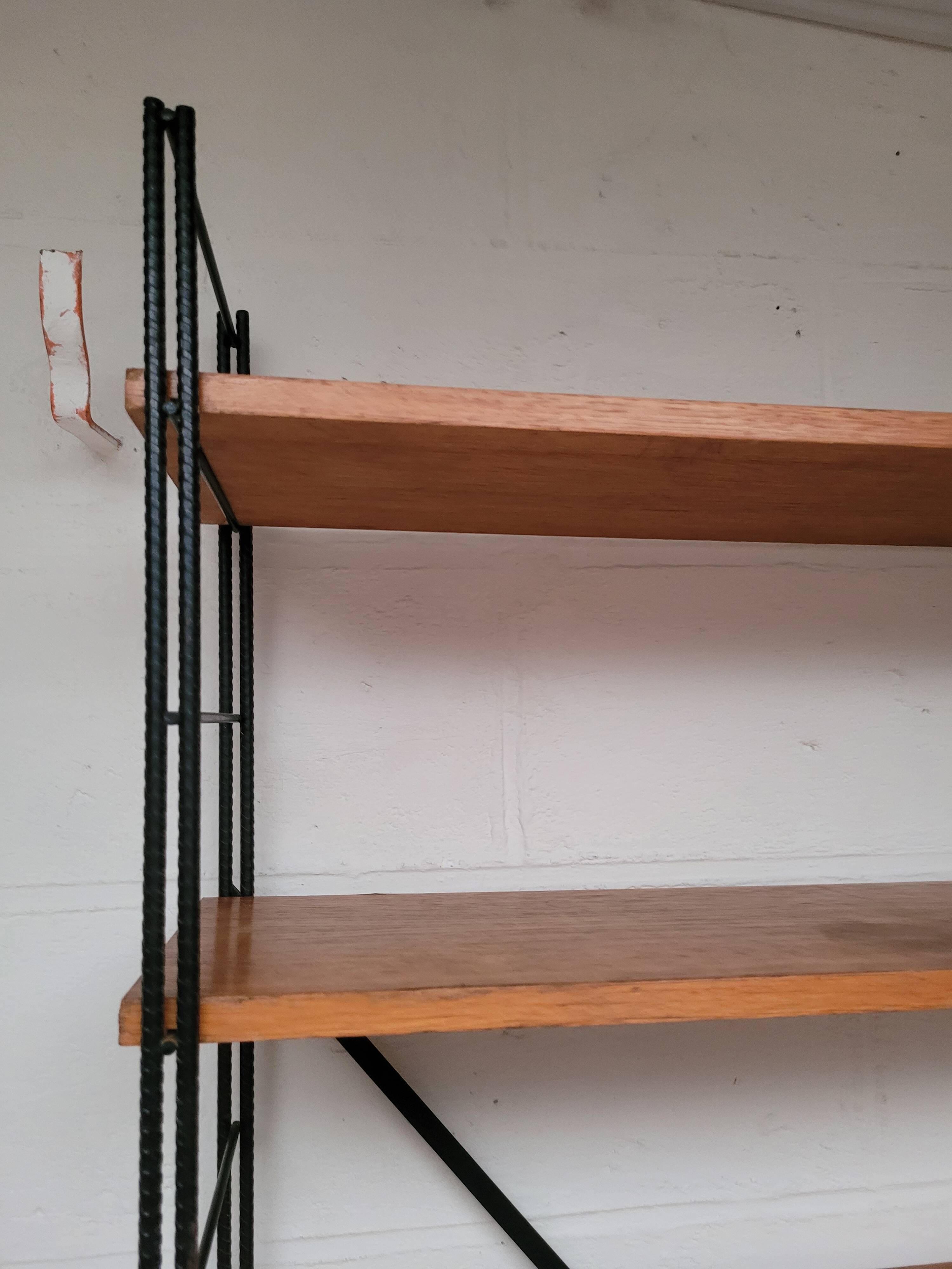 String bookcase on legs from the 50s