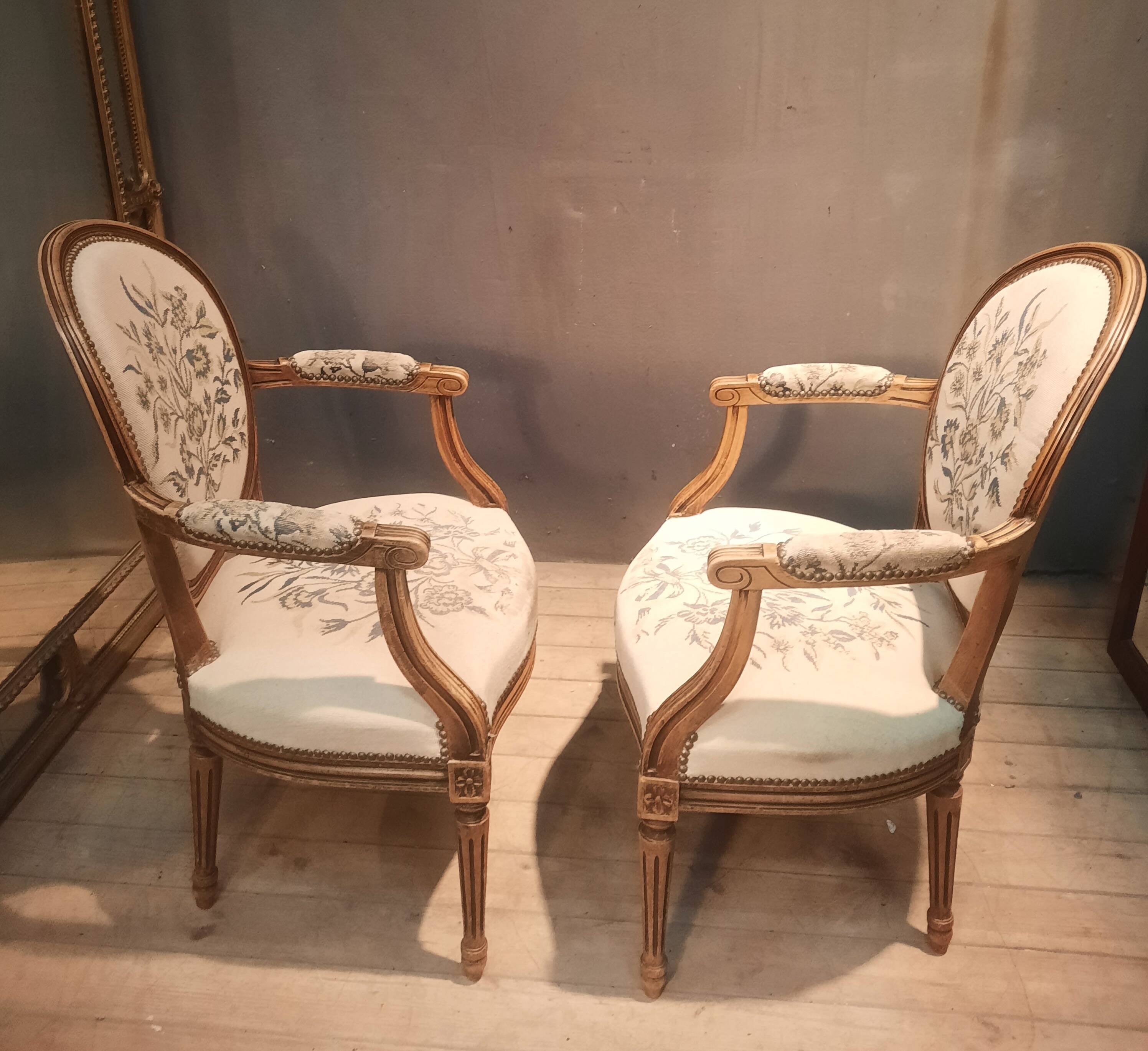 Pair of Louis XV style medallion armchairs.