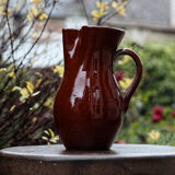 Terracotta pitcher, rust colour
