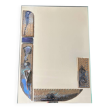 Mirror with ceramic inclusion