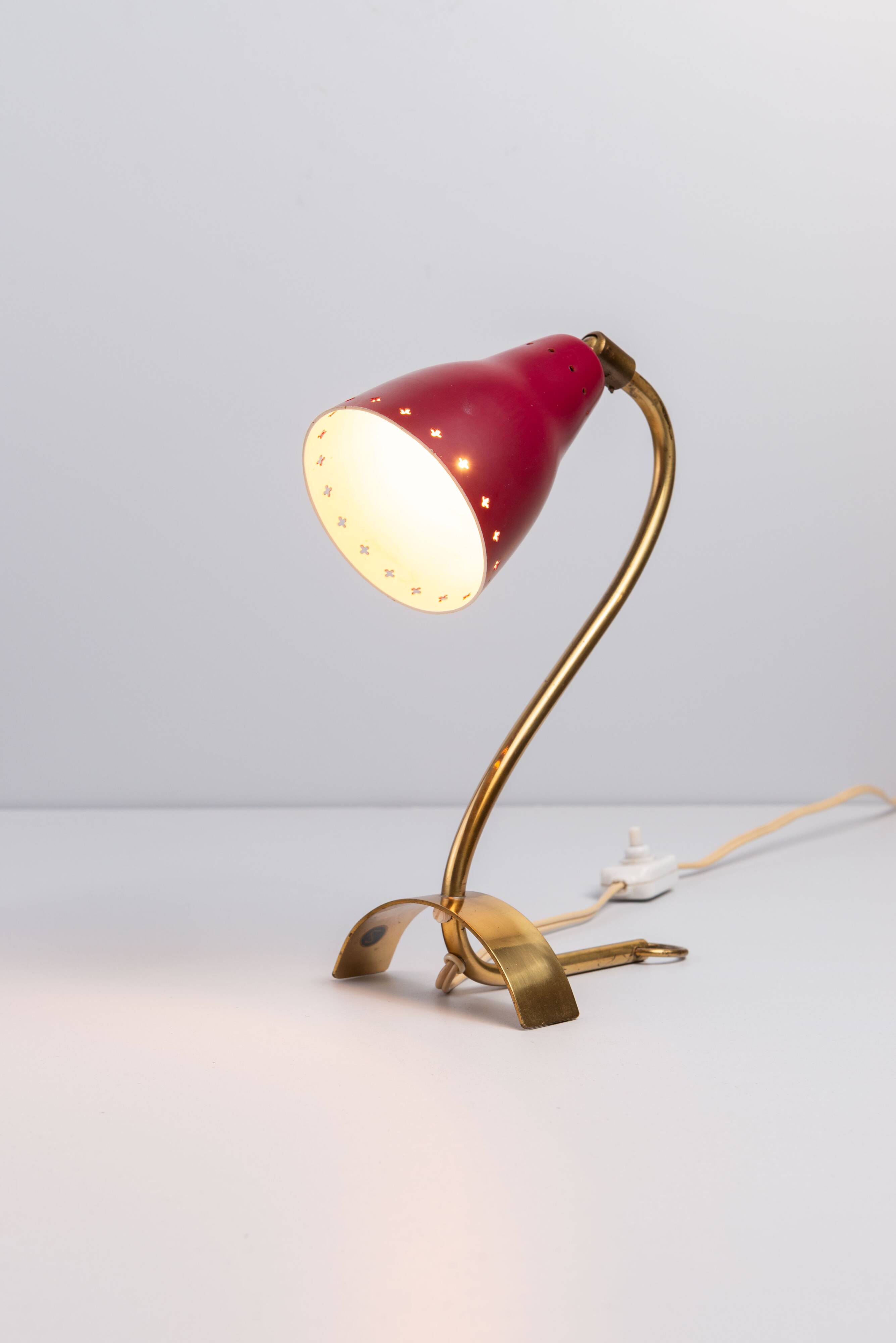Brass wall lamp with perforated metal shade, 1950s, Sweden