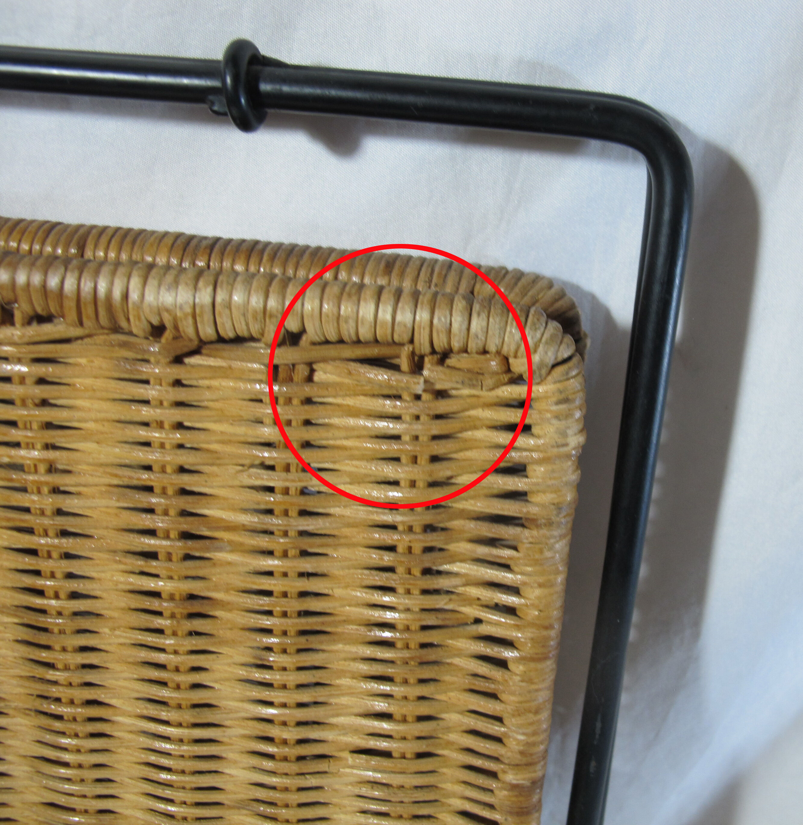 Vintage magazine rack in metal and wicker