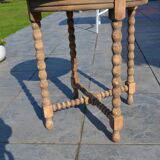 old small round oak table with can legs