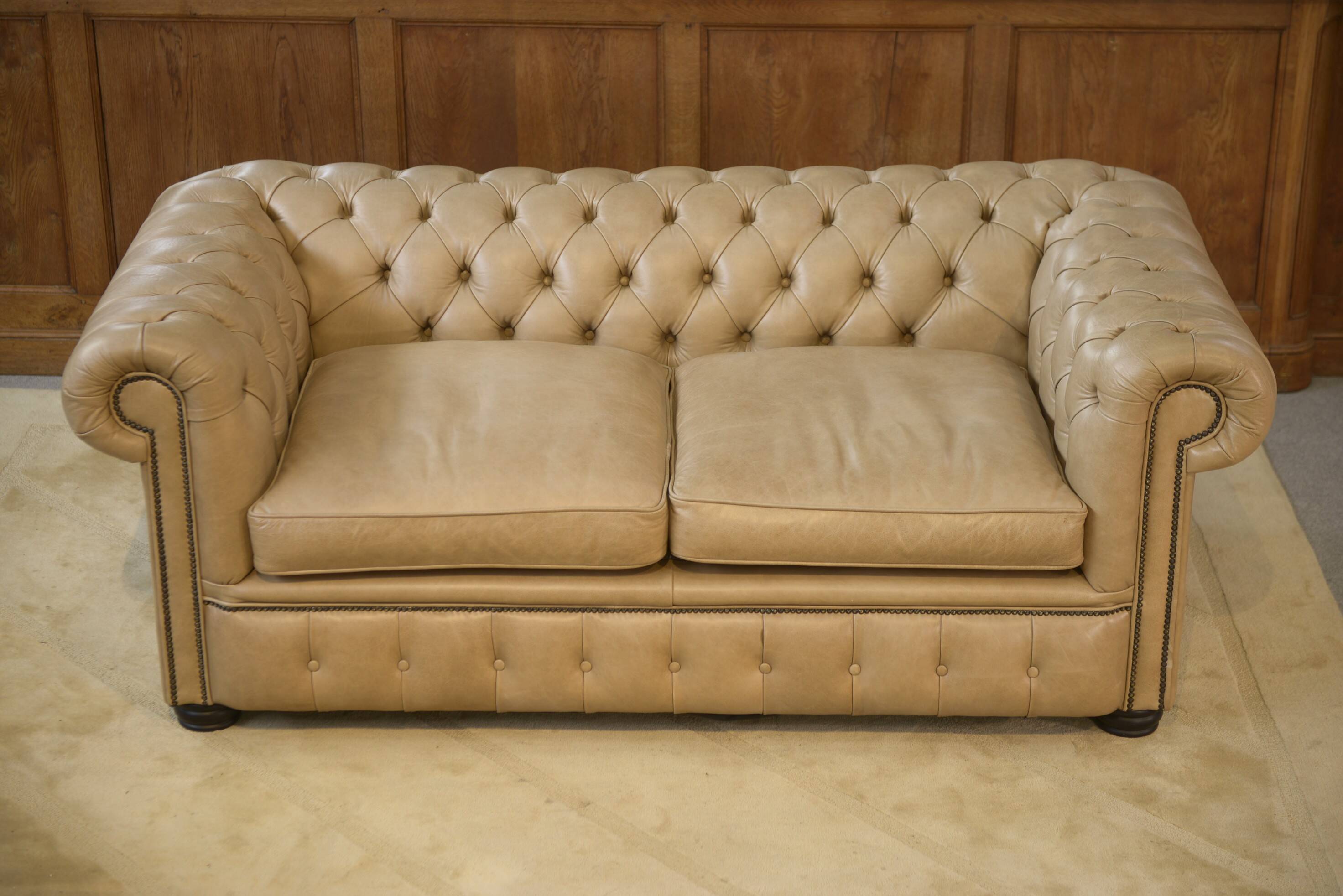 Beige leather Chesterfield sofa handmade in England.