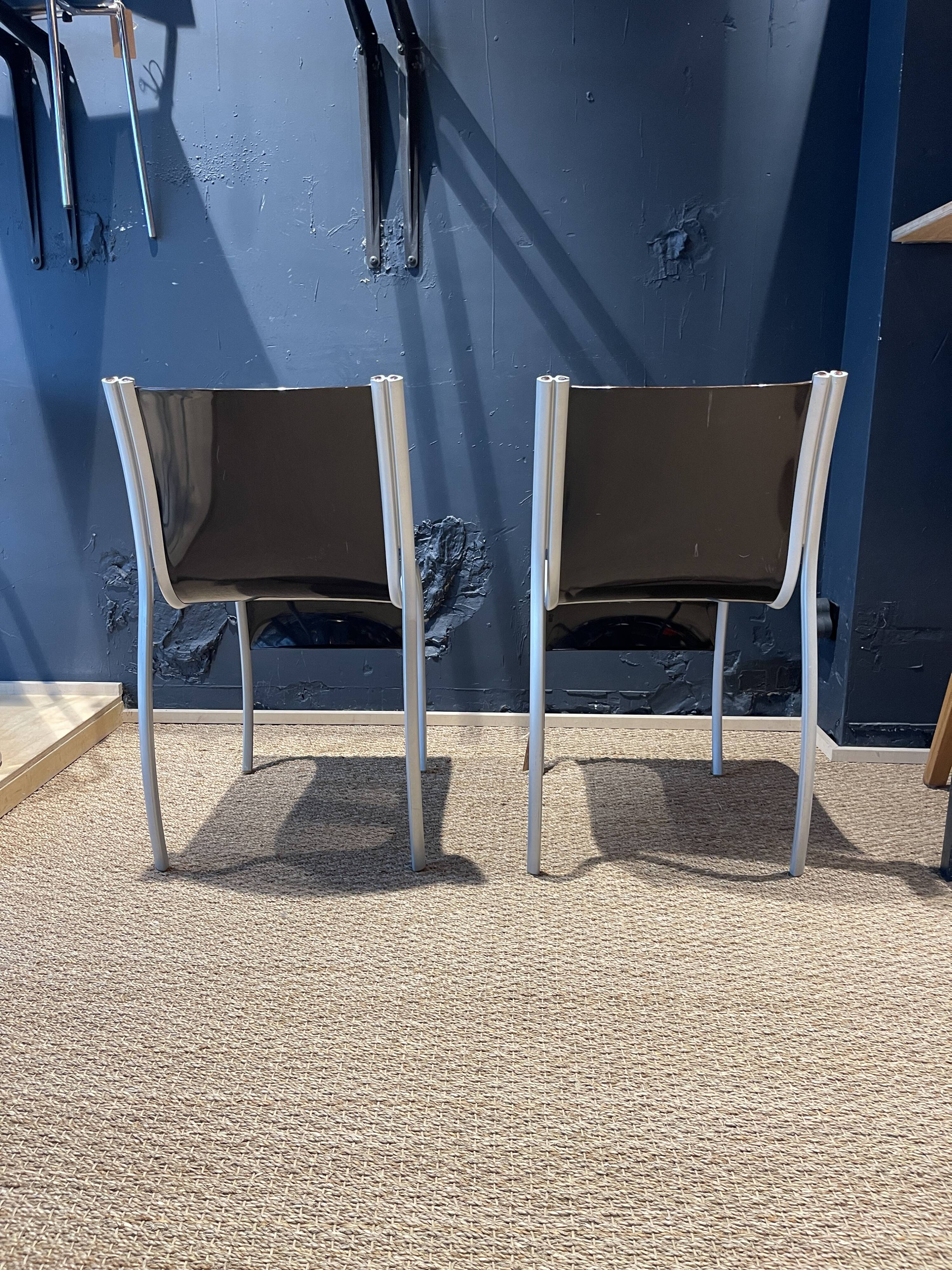 Pair of FPE chairs by Ron Arad for Kartell black Italy 2000s