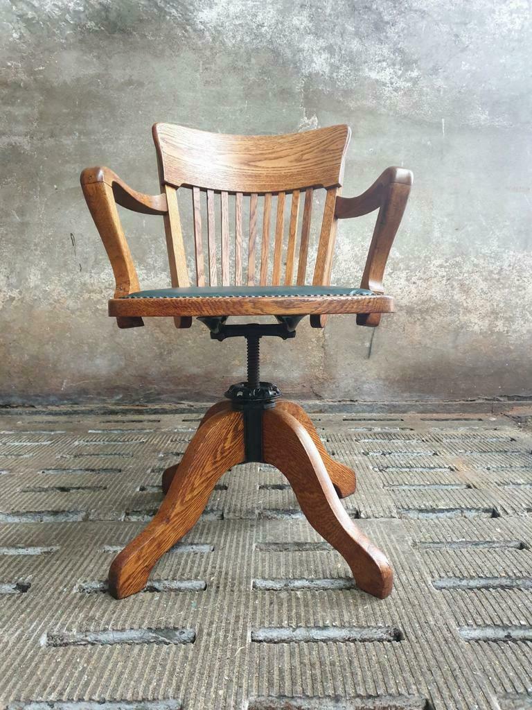 Antique office chair oak adjustable with green leather