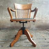 Antique office chair oak adjustable with green leather