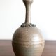 Brown ceramic vase with a long neck, 1950s.