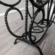 Vintage wrought iron magazine rack