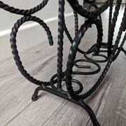 Vintage wrought iron magazine rack
