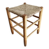 Tabouret bas vintage en bois et assise paillée