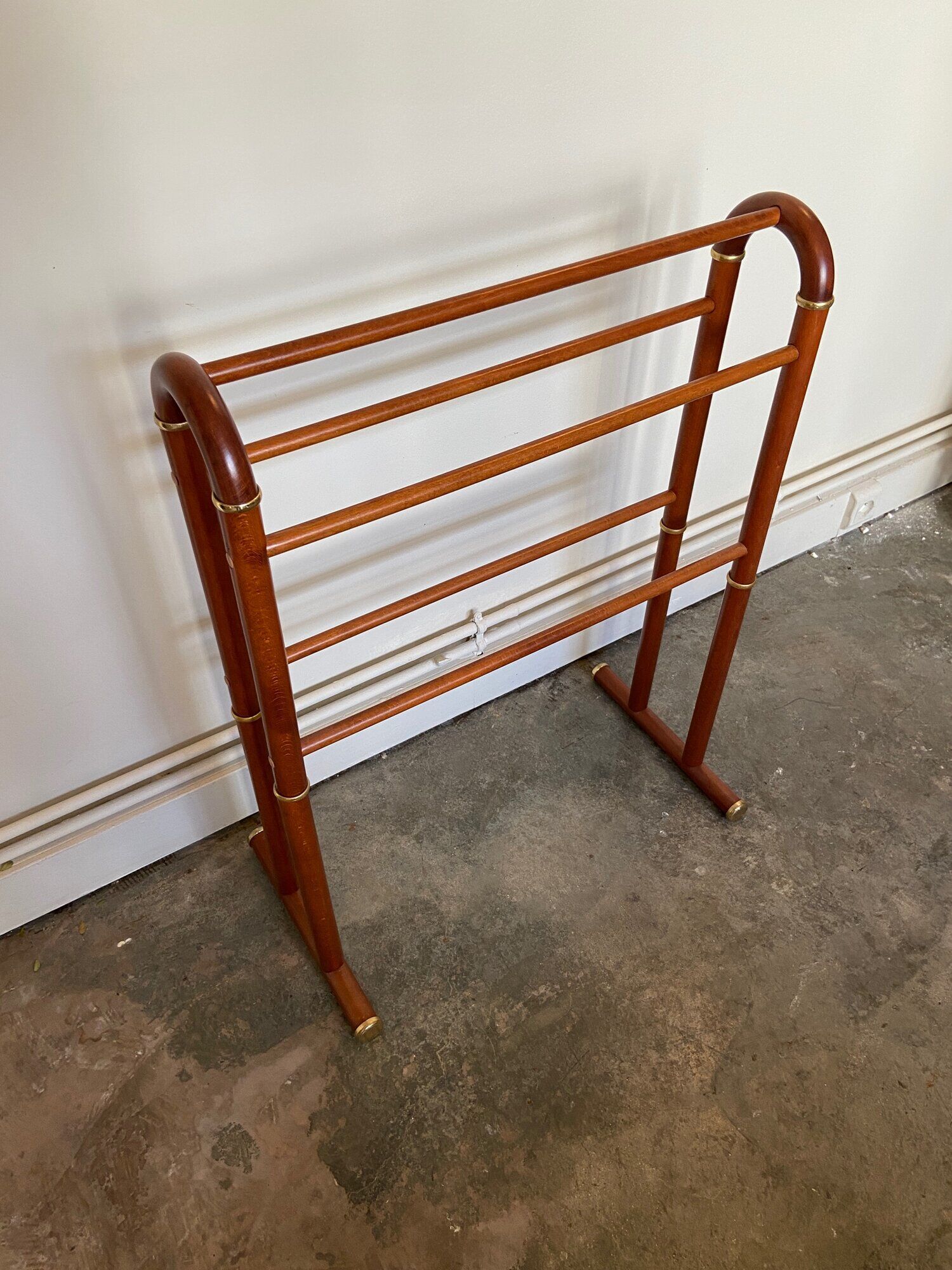 Dark wood towel rail